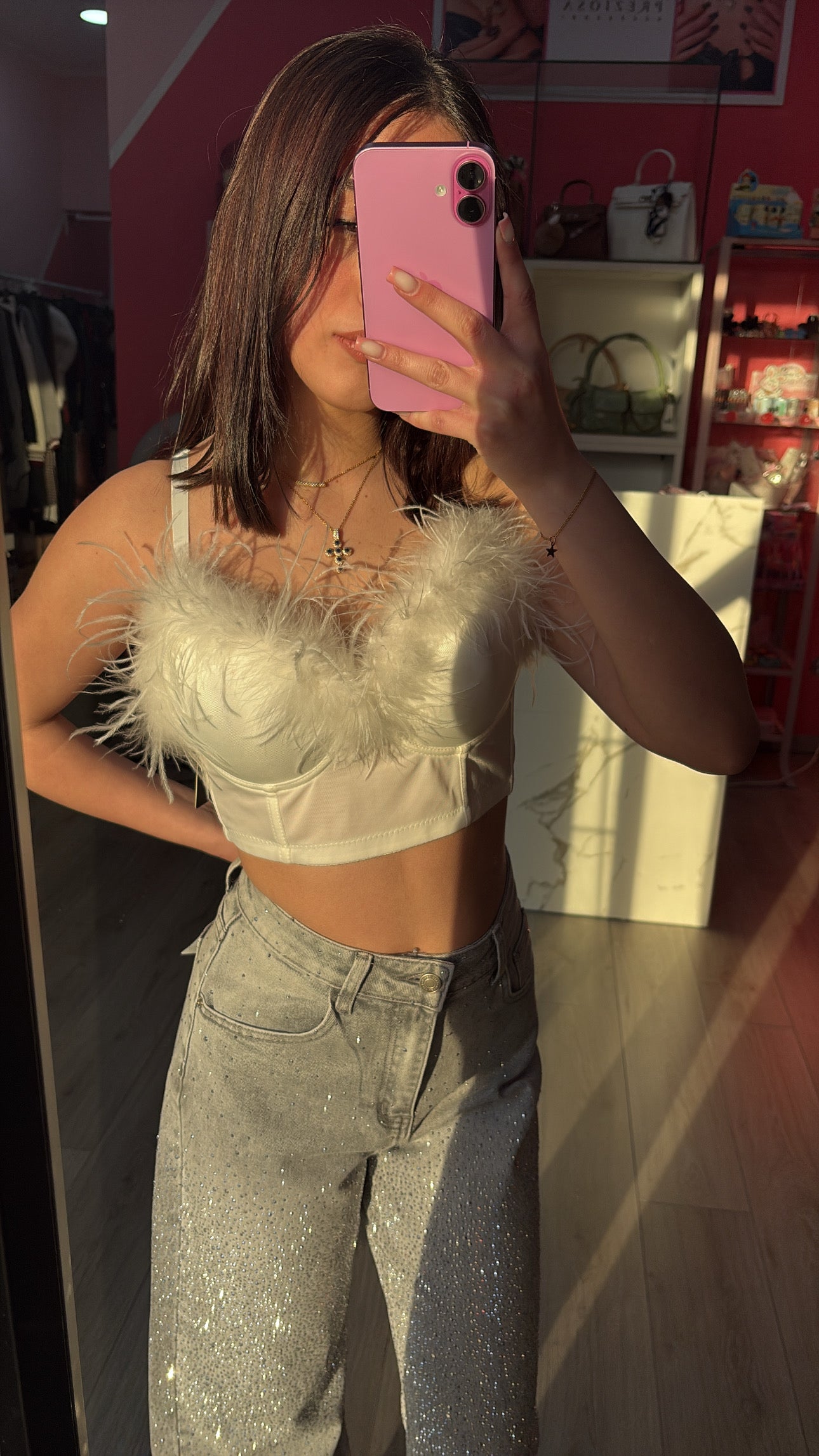 Top con piume
